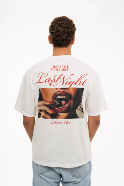 Photo taken from the back of model Gustavo wearing the Hangover Oversized White T-shirt by Dropout.