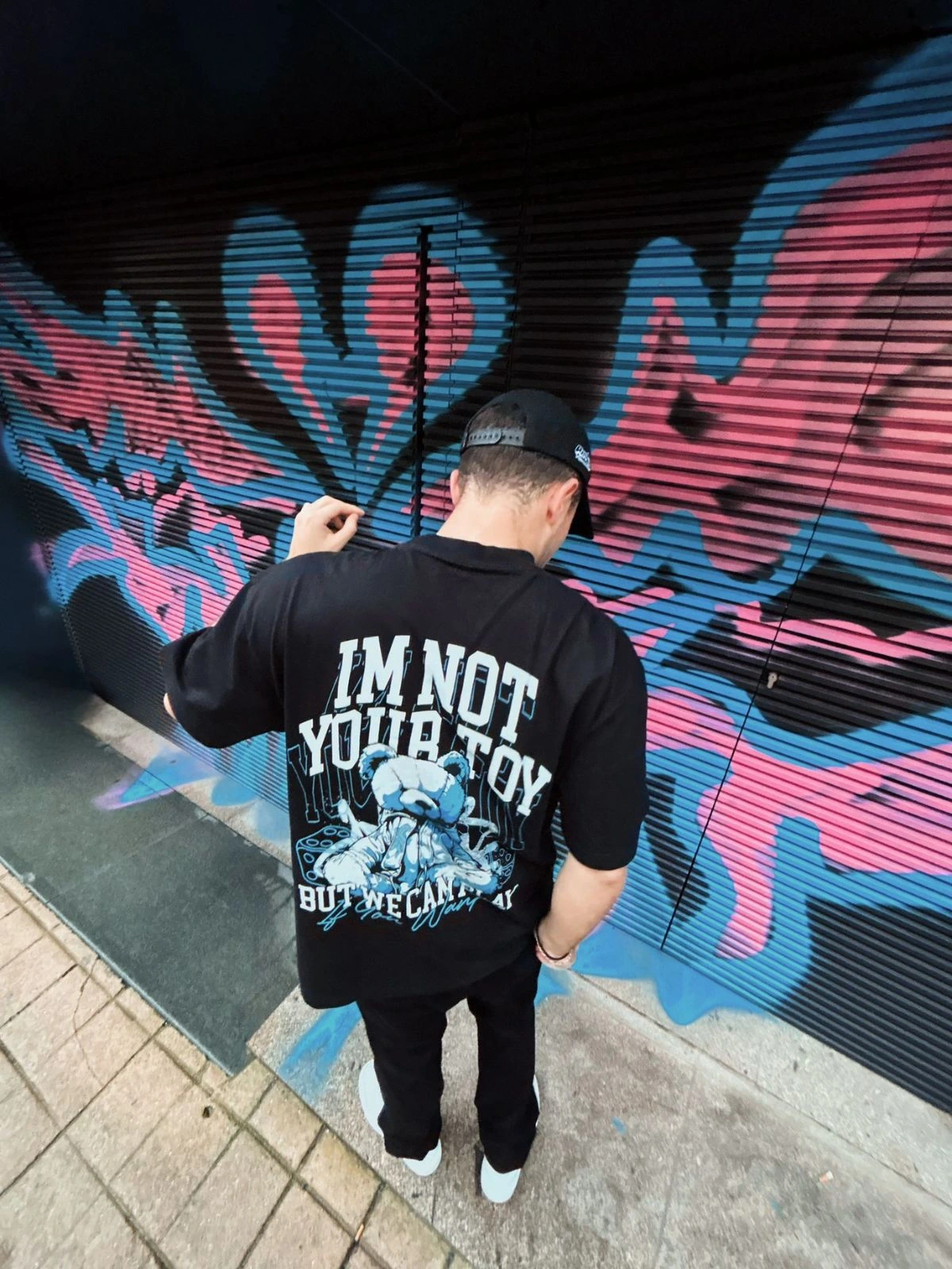 Close-up of a Dropout t-shirt showing bold graphic artwork